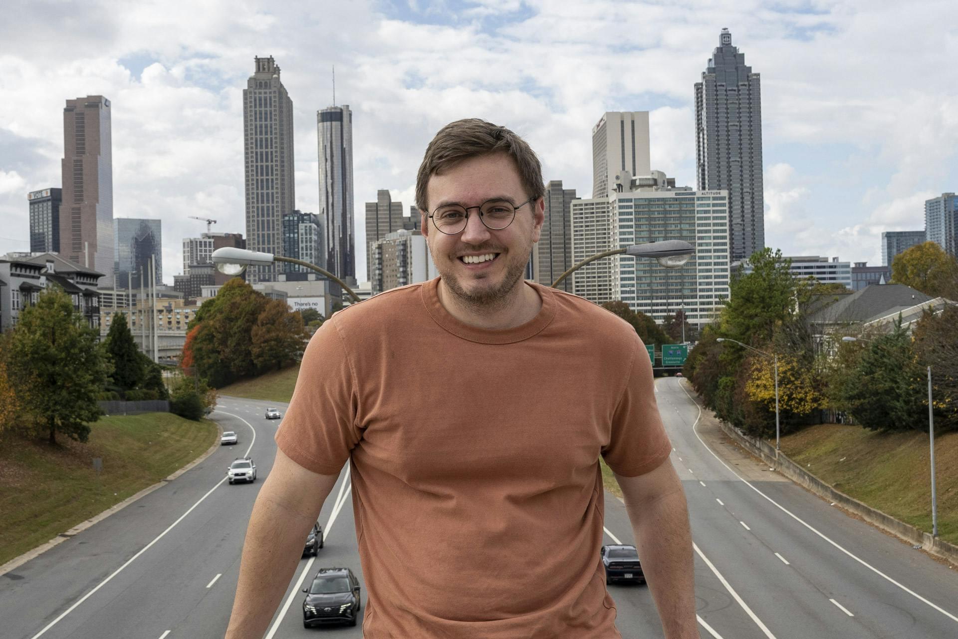 Hunter Becton in front of the Atlanta skyline