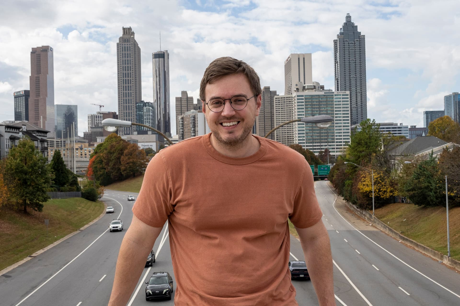 Hunter Becton in front of the Atlanta skyline